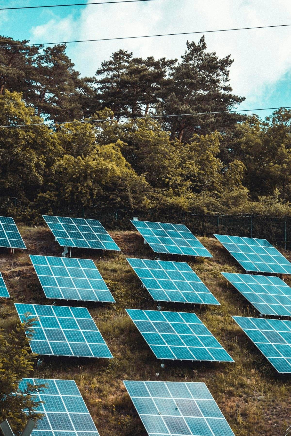 Solar panels on hillside - hybrid and off-grid systems